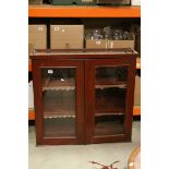 19th century Glazed Display Cabinet with Two Doors opening to reveal Two Shelves with Leather