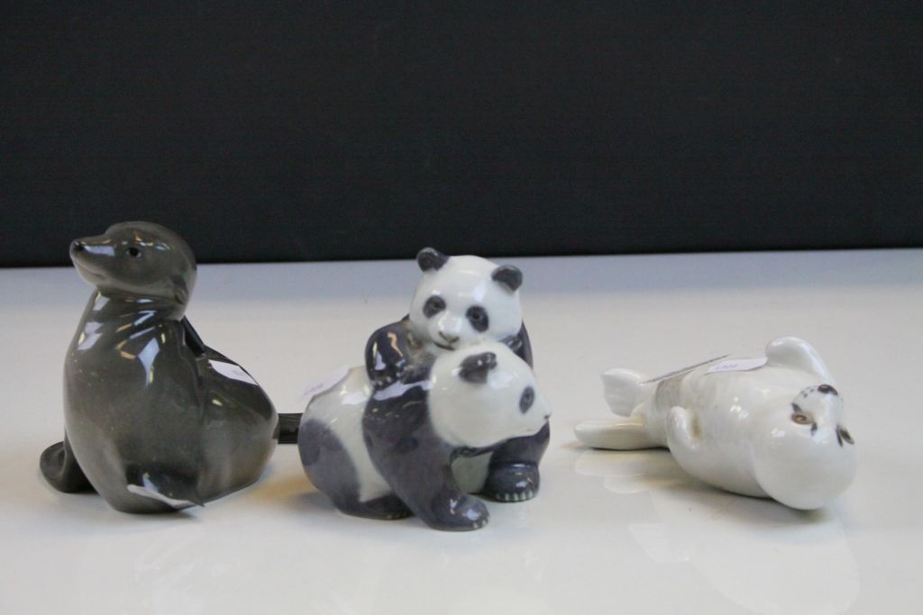 Three Royal Copenhagen ceramic Animals to include; Seal scratching it's ear number 327 (damaged),