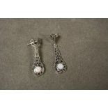 A pair of silver marcasite and opal drop earrings