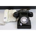 Mid 20th century bakelite telephone and one other touch button phone
