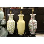 Oriental famille rose vase converted to lamp and two other oriental ceramic lamps