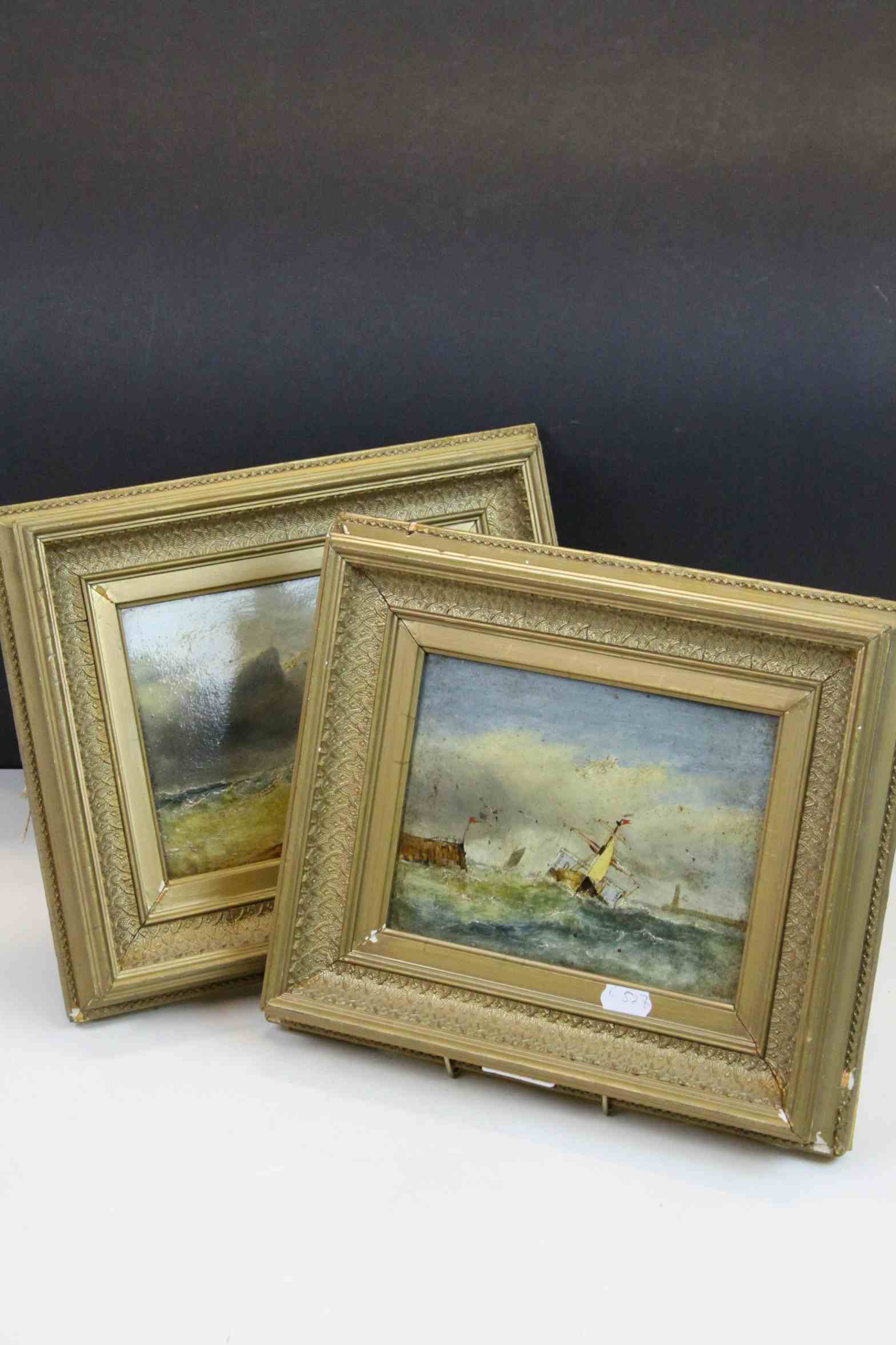 Pair of gilt framed oil paintings of coastal scenes