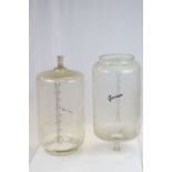 Vintage pair of large Glass liquid containers with Lbs & Gallons measurements & marked "