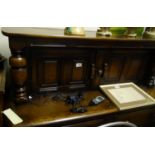 Antique style court cupboard, cluster of small cupboards to the top, above another cluster of