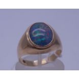 Ladies Victorian firey opal dress ring, oval shaped stone to the centre, 1/4" long approx