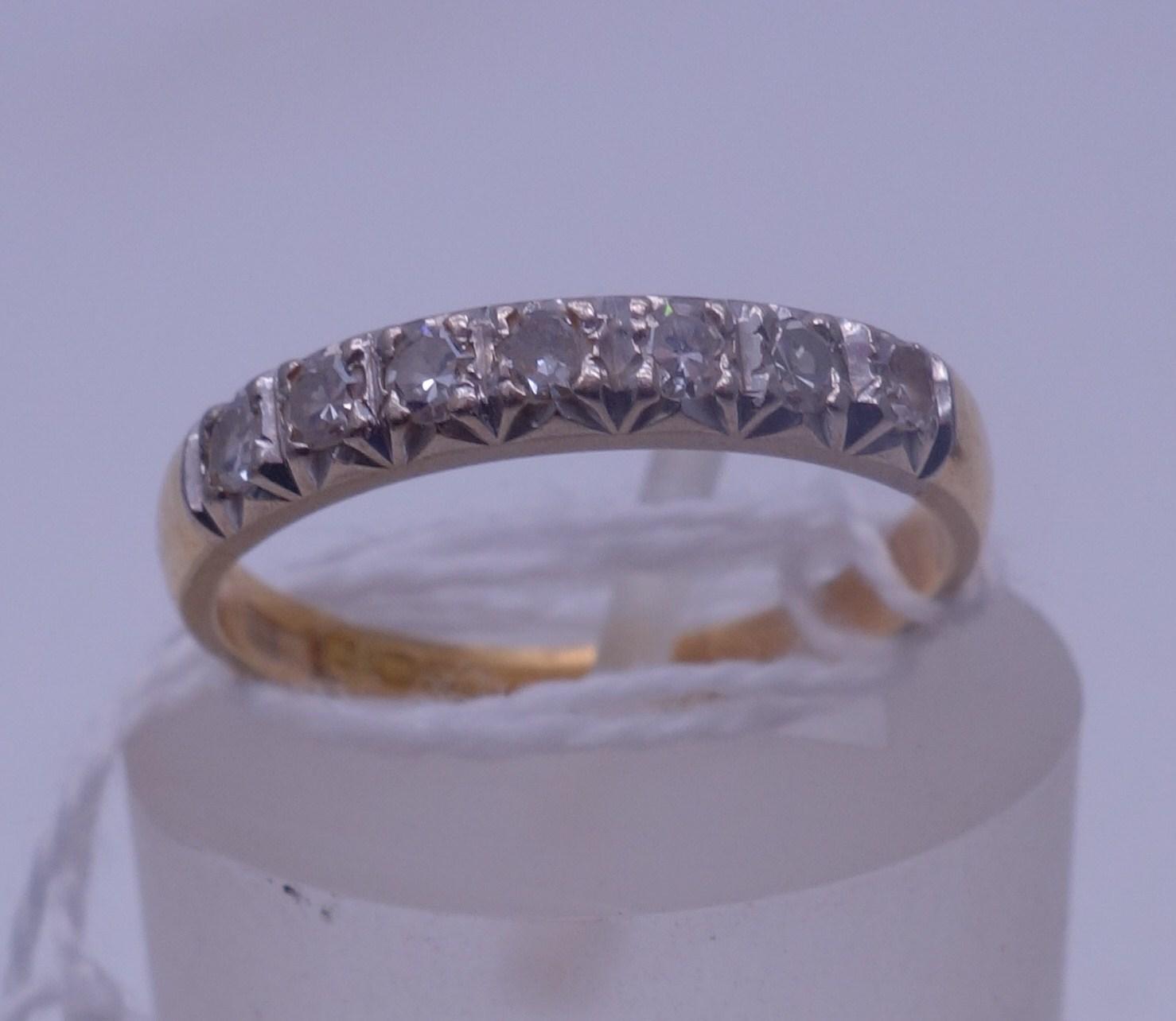 18ct gold half hoop diamond ring size K the top set with 7 small diamonds, Sheffield h/m c1950's 2.4