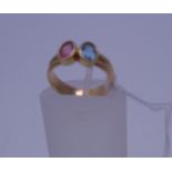 Ladies 9ct gold ring set with aquamarine and pink tourmaline size I 18ct gold Sheffield h/m c1950'