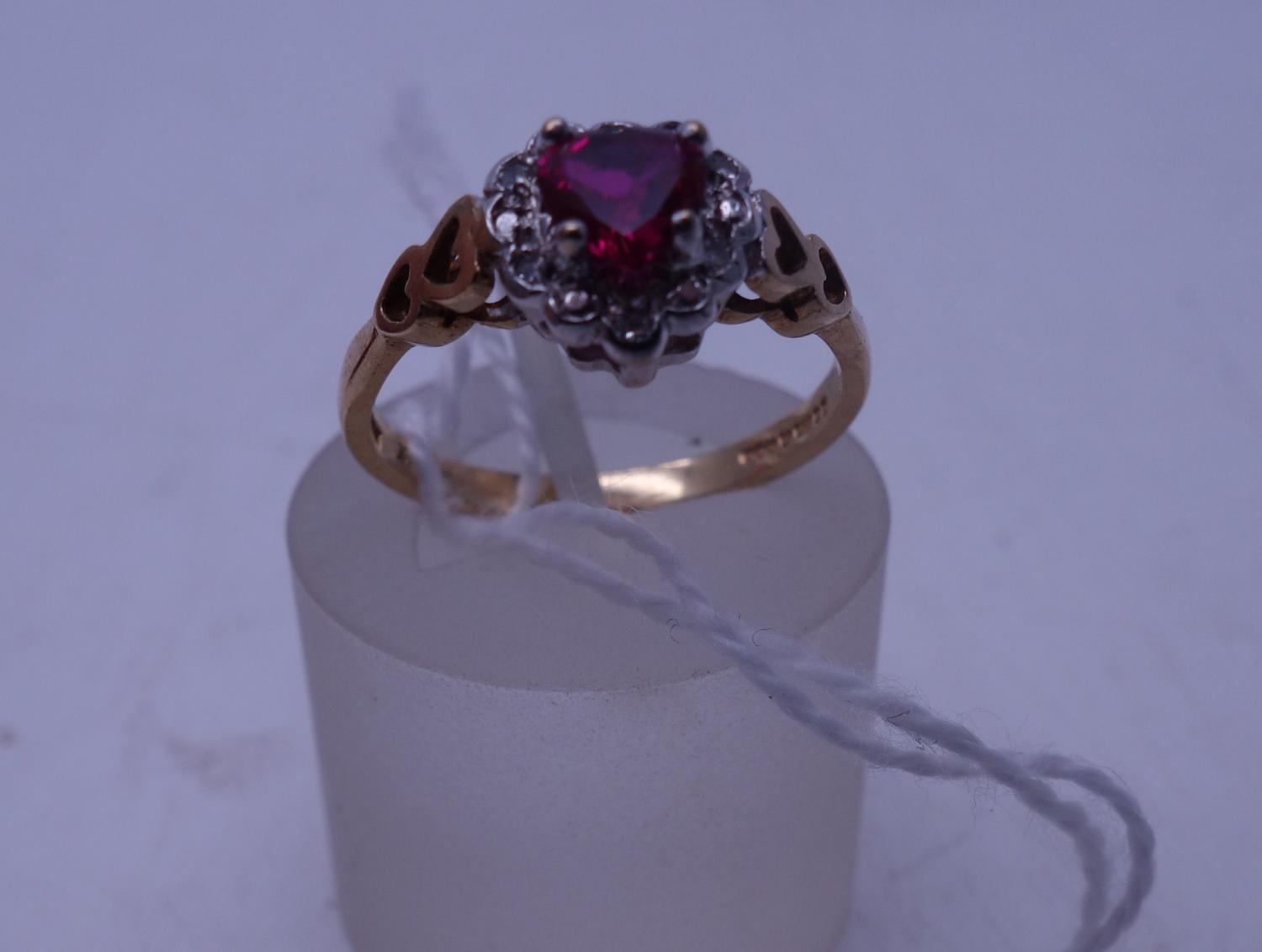 Ladies ruby and diamond 9ct gold ring size L