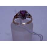 Ladies ruby and diamond 9ct gold ring size L