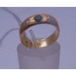 Sheffield h/m 22ct gold wedding band set with emerald and 2 x small diamonds, size L, 5 grams, h/m