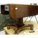 Mahogany veneered William 1V platform based sofa table with small drop sides and a single drawer
