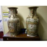 Famille Rose pattern large vases, 3' tall with gilt highlights 18" wide at their fullest,