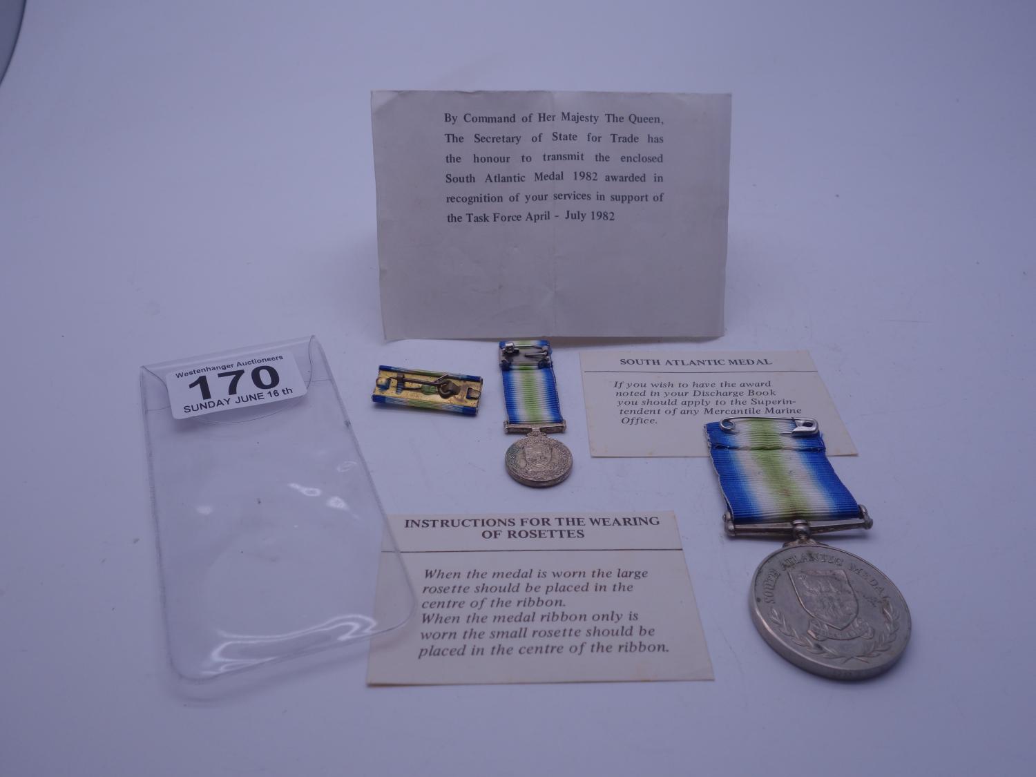 Falkland Islands, South Atlantic medal with pip and bar, and box containing presentation ticket, - Image 2 of 3