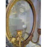 19 th century Girandole mirror in need of attention, twin branch candle holders set in an oval