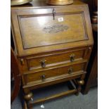 1920's Bureau with a fall front, all above 2 short drawers