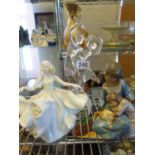 Lladro a terra cotta figurine, 2 children and a cat, 6" tall a Royal Doulton figure, Sweet 17, 8"