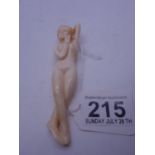 Interesting Ivory carved figure of a naked Goddess, 5" long has been split in half and re-glued, est