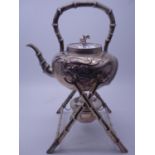 Chinese silver Meiji period, a tea kettle on stand, the stand in a bamboo style decoration with