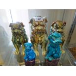 5 x Oriental firey beasts or dogs of foo, the largest being 10" tall the smallest blue one being