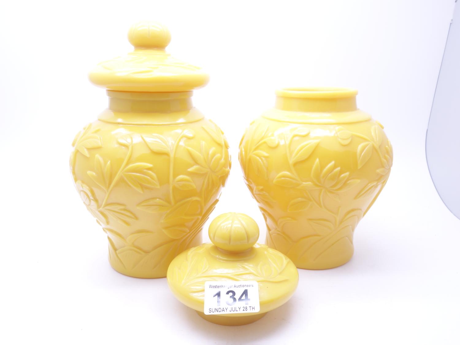 Pair of antique style yellow glazed Oriental Ginger Jars and lids, each one measures 8" tall with