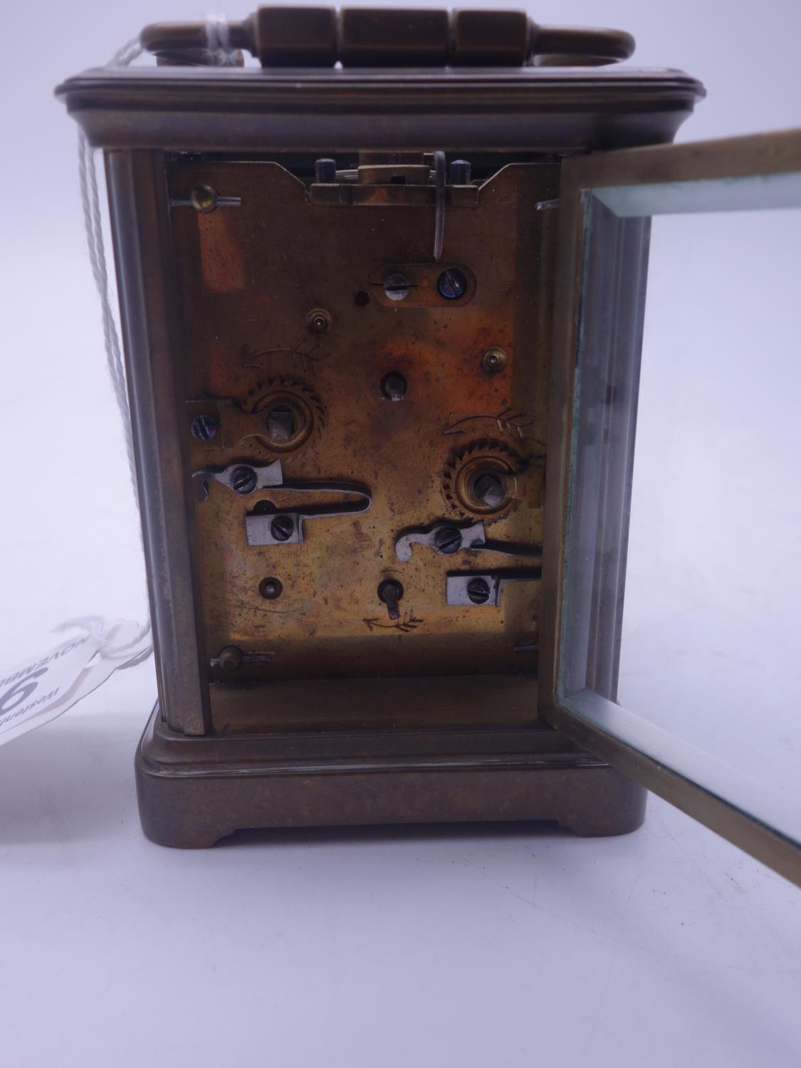 French early 20th century small travelling alarm clock with 4 glass sides, visible escapement to the - Image 3 of 4