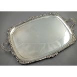 A large twin handle silver tray, Walter & John Barnard, London 1891, rectangular with a gadrooned