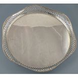 A circular silver tray, Birmingham 1911, Williams (Birmingham) Ltd, with a lattice pierced