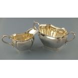 A fine quality silver cream jug and matching sucrier, Sheffield 1926, Hamilton Laidlaw Co., of