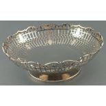 A silver fruit bowl, Sheffield 1947, Edward Viner, circular with a pierced body and raised on a