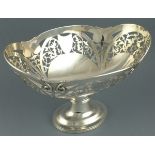 A silver pedestal basket, Sheffield 1910, Daniel George Collins, oval form with pierced foliate