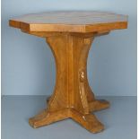 After Robert 'Mouseman' THOMPSON An octagonal occasional table, the adzed top on a shaped cross base