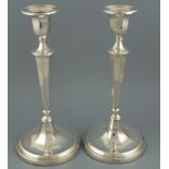 A pair of silver candlesticks, Sheffield 1904, Fordham & Faulkner, of octagonal tapering form with