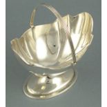 A sliver bon bon basket, London 1898, Thomas Bradbury, of oval form including a swing handle and