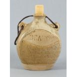 Calenick pottery brandy flask, grey speckled glaze with an un-glazed lozenge stamped Brandy, the