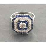 A large platinum Victorian style sapphire and diamond cluster ring set with a central old cut