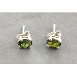 A pair of green tourmaline ear studs