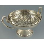 A twin handled silver rose bowl, London 1925, Mappin & Webb, the handles with cast leaf capping