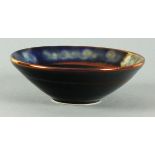 DILKS-HOFFMAN studio iridescent blue glazed bowl with copper bands and vitruvian scroll rim,