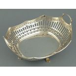 A silver fruit basket, Sheffield 1926, Atkin Bros., of rectangular form with a scalloped rim pierced