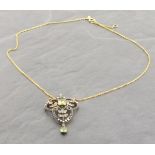 Unusual design necklace set with peridot, diamonds and seed pearl