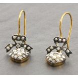 Heart shape drop earrings with bow tops set with diamonds and seed pearls