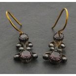 Ornate garnet and diamond drop earrings