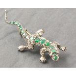 A gem set brooch, modelled in the form of a lizard, 7.5gms