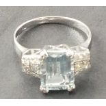 An 18ct white gold aquamarine and diamond dress ring, aquamarine 2.78ct, total diamond carat