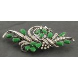 A jade and diamond set brooch, modelled in a floral form, marked 18k 10gms