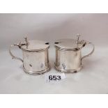 A pair of drum mustards, each with raised thumb piece 2.5" over handle. B'ham 1924 140g.ex.