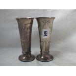 A pair of cone shaped spill vases, embossed with garlands 6" high. Lon. 1918 by RP