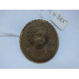 Large gold mounted lava cameo brooch 4.5 cm long