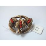 Antique gilt coral set brooch