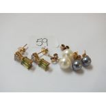 Three pairs of 9ct mounted ear studs